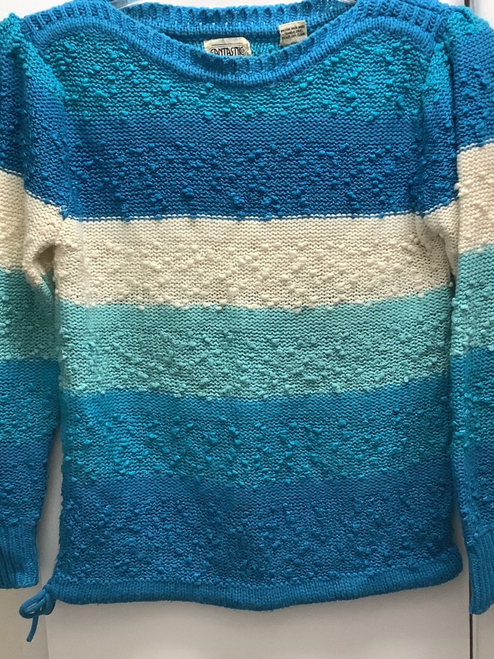 Woman’s (L) striped textured retro knit style drawstring waist sweater top